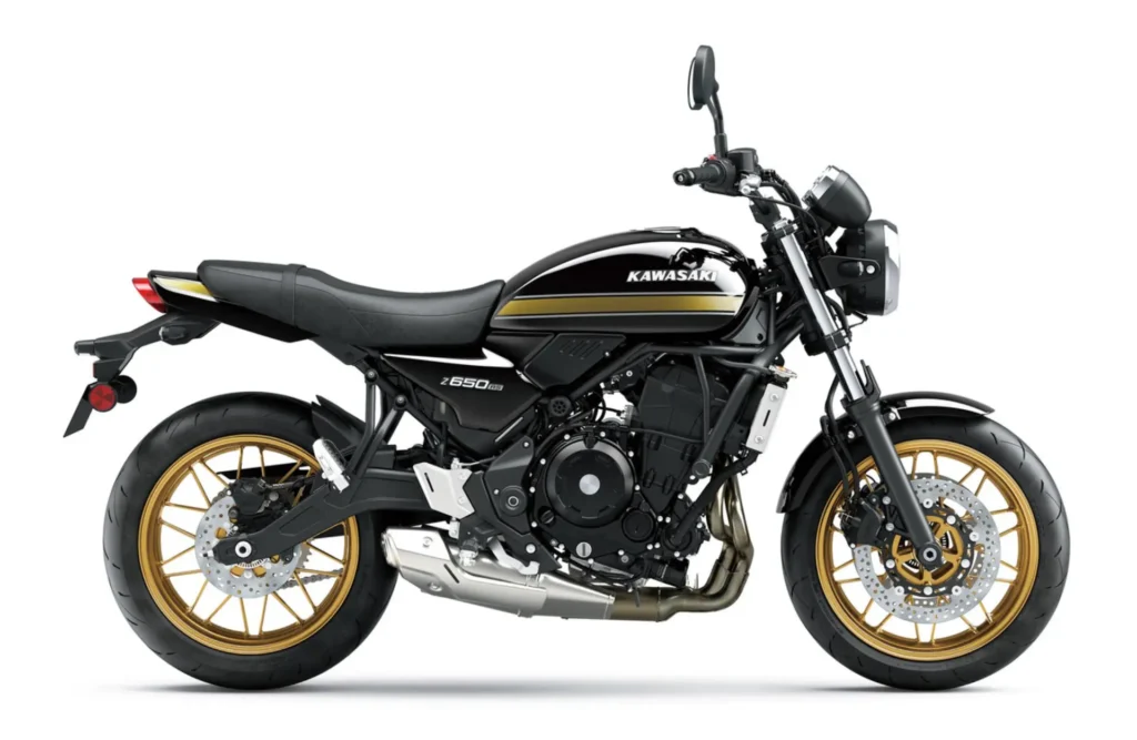 Kawasaki Z650RS retro roadster motorcycle side view, black and gold color, classic styling with modern performance