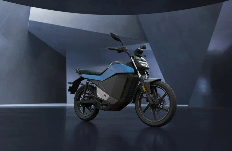 The Ola Roadster X electric motorcycle featured during the 2026 Holi Mahotsav sale with its modern LED headlights and digital display.